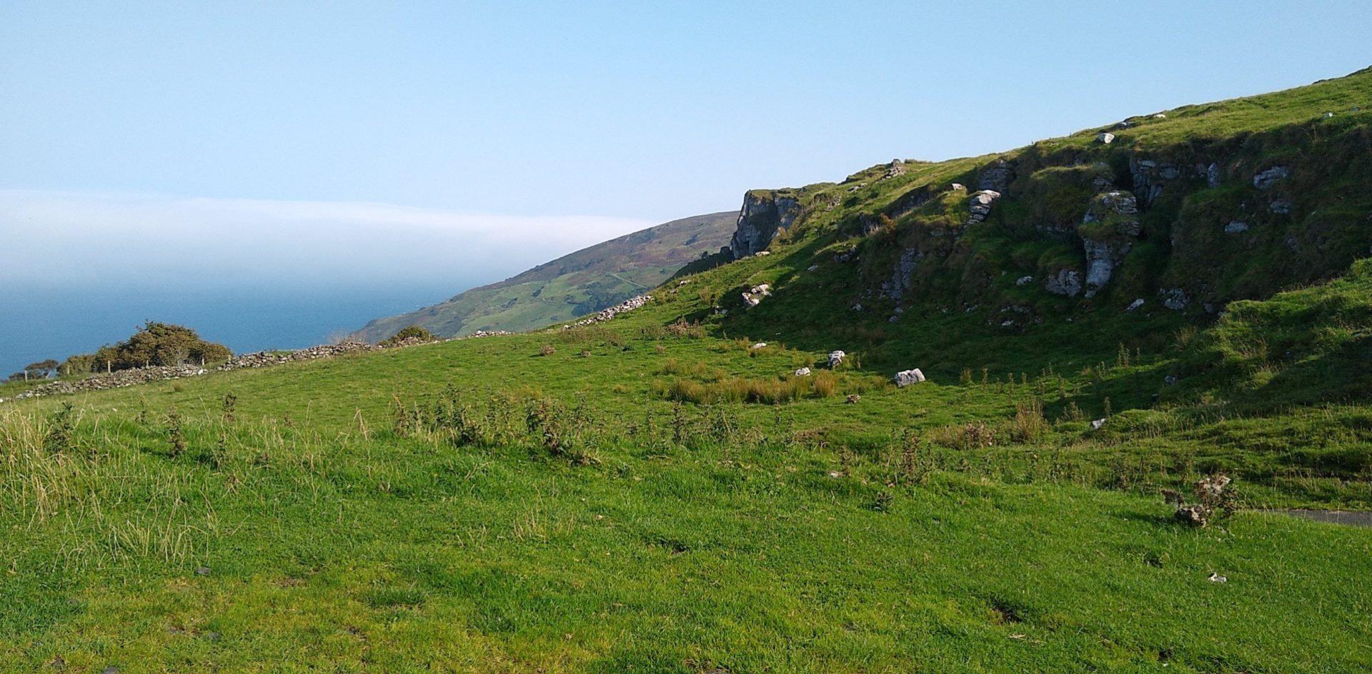 Green countryside of Merlough Bay
